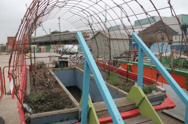 A skip converted into a mobile garden