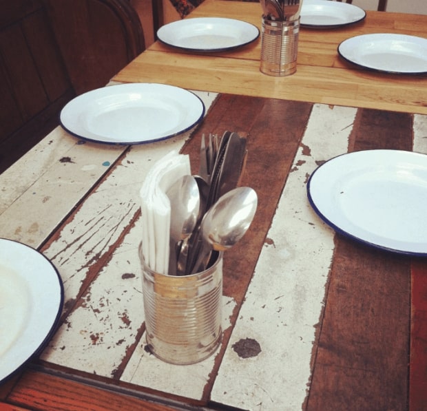 Tin can cutlery holder and floor board tables