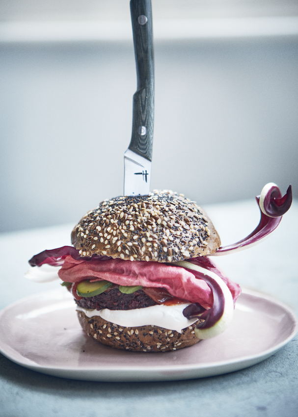 Vegan burger with a knife